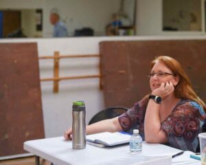 Kristal Seid, a musical theatre coach, directing a rehearsal, showcasing her expertise in musical theater.